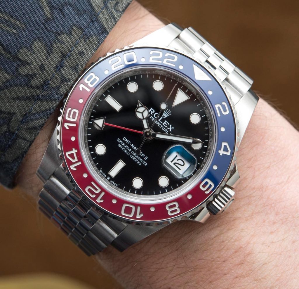 The luxury replica watches have blue and red ceramic bezels.